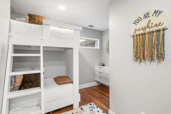A bunk bed room with a small desk and a wall decoration saying "YOU ARE MY sunshine". - Modern Mountain Oasis • 5BR with Million-Dollar Lake Views • EV• Hot Tub • PetOK (Blue Ridge)