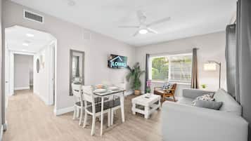 Premium 2-Bedroom Family Suite w/ Kitchen & Sofa Bed | Living area | 50-inch Smart TV with digital channels