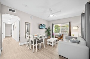 Premium 2-Bedroom Family Suite w/ Kitchen & Sofa Bed | Living area | 50-inch Smart TV with digital channels