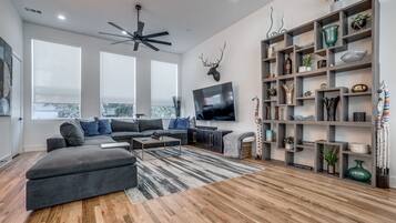 Townhome | Living area | 55-inch Smart TV with digital channels, TV