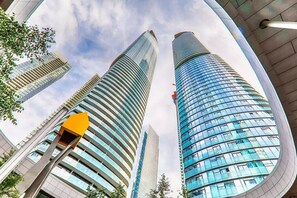 Two sleek skyscrapers stand tall in a contemporary business district.