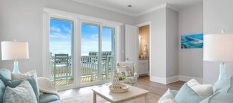 Beautiful beach views with top floor living area.  Walkable to shops and attractions. Tastefully decorated!