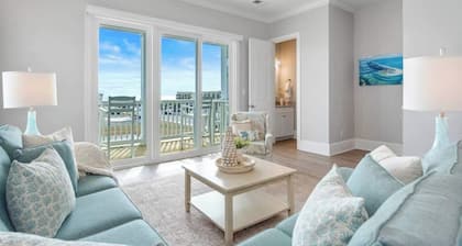 Beautiful beach views with top floor living area. Walkable to shops and attractions. Tastefully decorated!