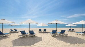 On the beach, sun loungers, beach umbrellas, beach towels - InterContinental Residences Nha Trang by IHG (Nha Trang)