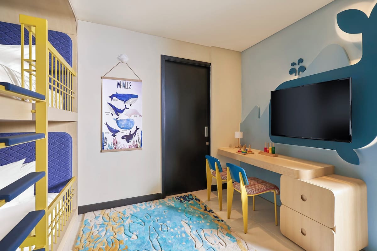 Suite, 2 Bedrooms, Ocean View (1 King, 1 Bunk Bed) | In-room safe, laptop workspace, soundproofing, iron/ironing board