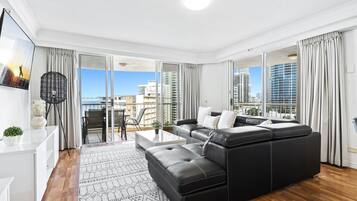 Apartment, 3 Bedrooms, Ocean View | Living area | 23-inch flat-screen TV with cable channels, TV