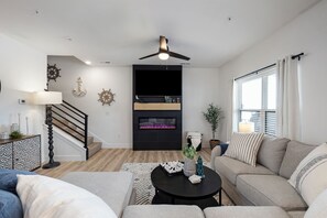 Smart TV, fireplace, foosball