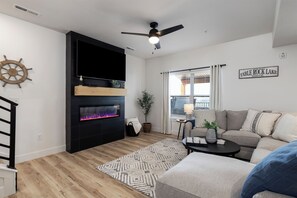 Smart TV, fireplace, foosball