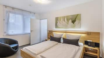 1 habitación, tabla de planchar con plancha, wifi gratis y ropa de cama