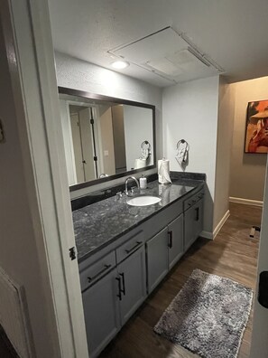 Hair dryer, towels, soap, shampoo