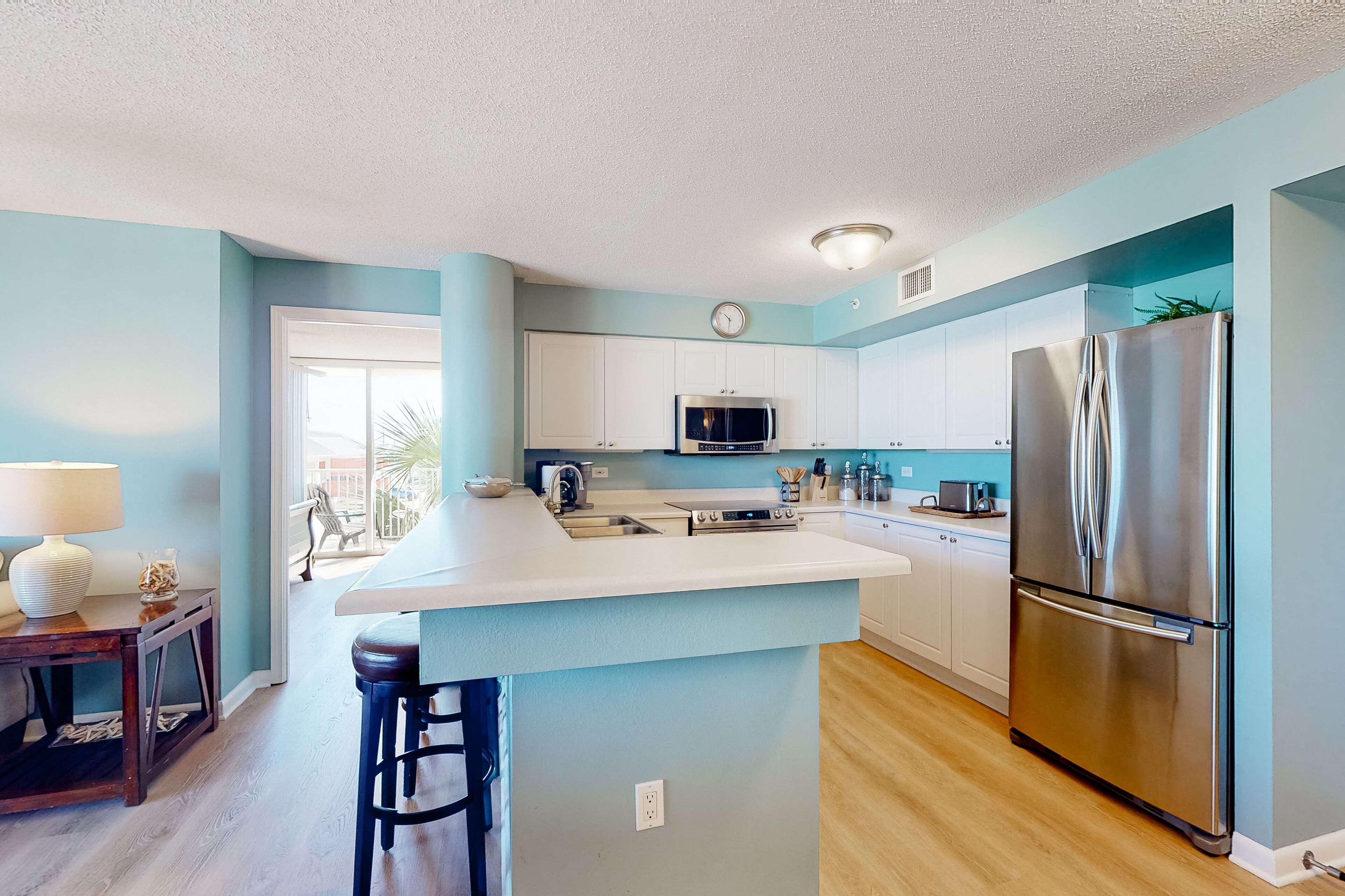 Relaxing Dune Pointe condo with balcony, pool,  full kitchen, & washer/dryer