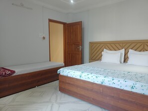 Standard Triple Room | Desk, blackout drapes, iron/ironing board - Mi Casa (Guwahati)