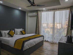 Quarto superior | Frigobar, Wi-Fi de cortesia
