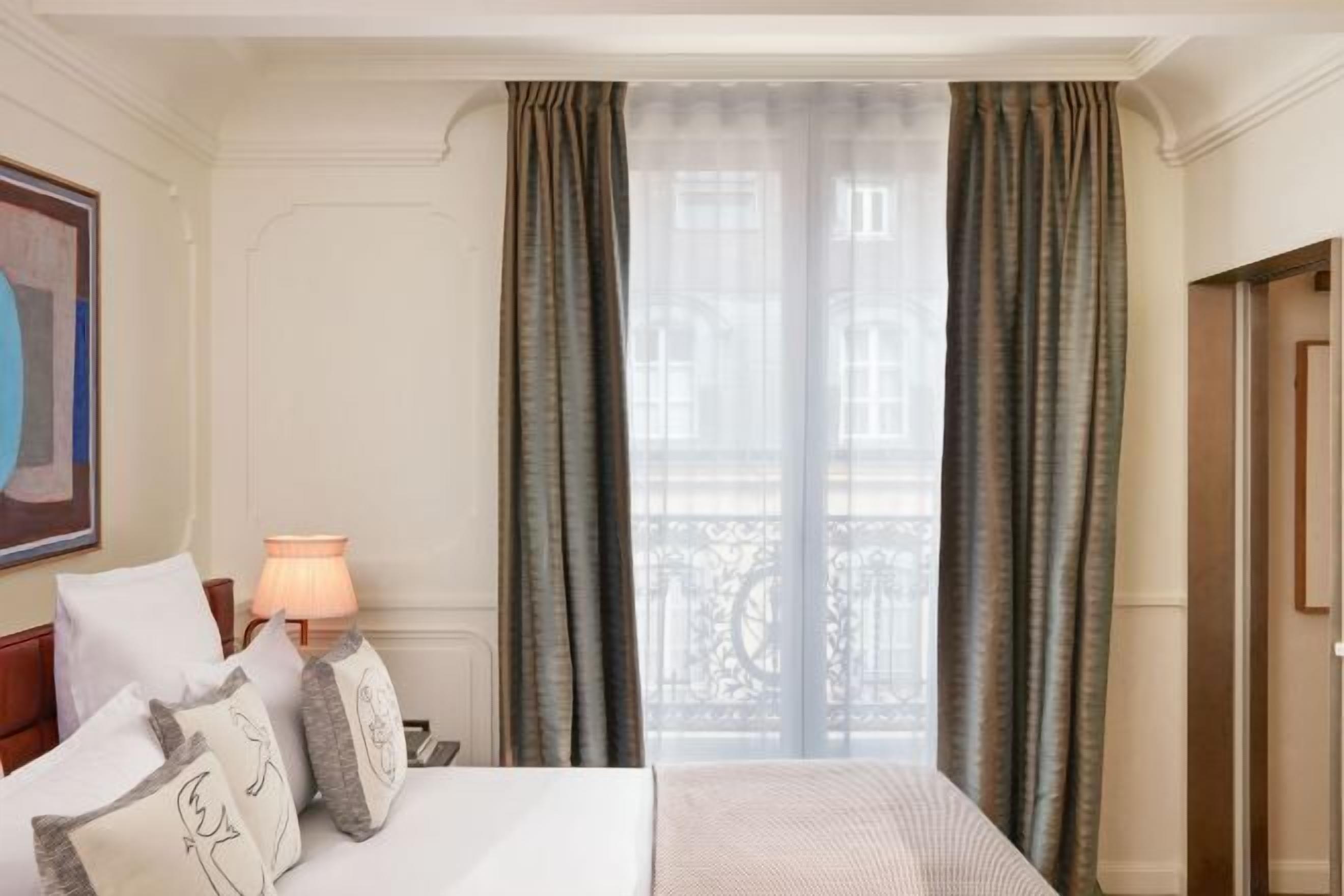 Premium bedding, pillow-top beds, minibar, in-room safe