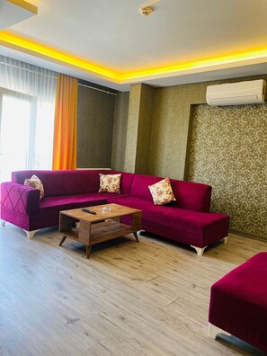 Habitación familiar | Área de sala de estar