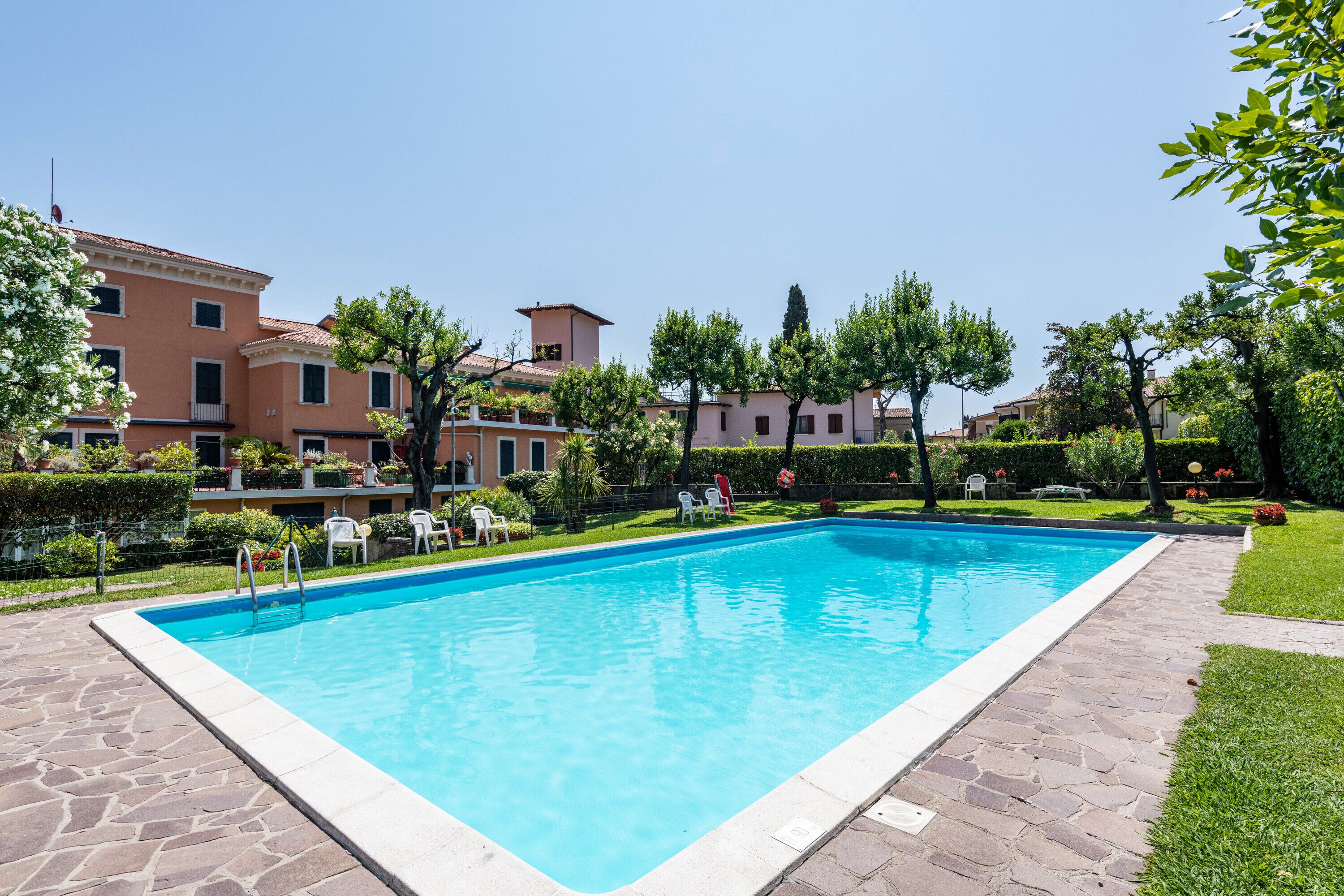Holiday Home 'Appartamento 303' with Shared Pool and Shared Garden