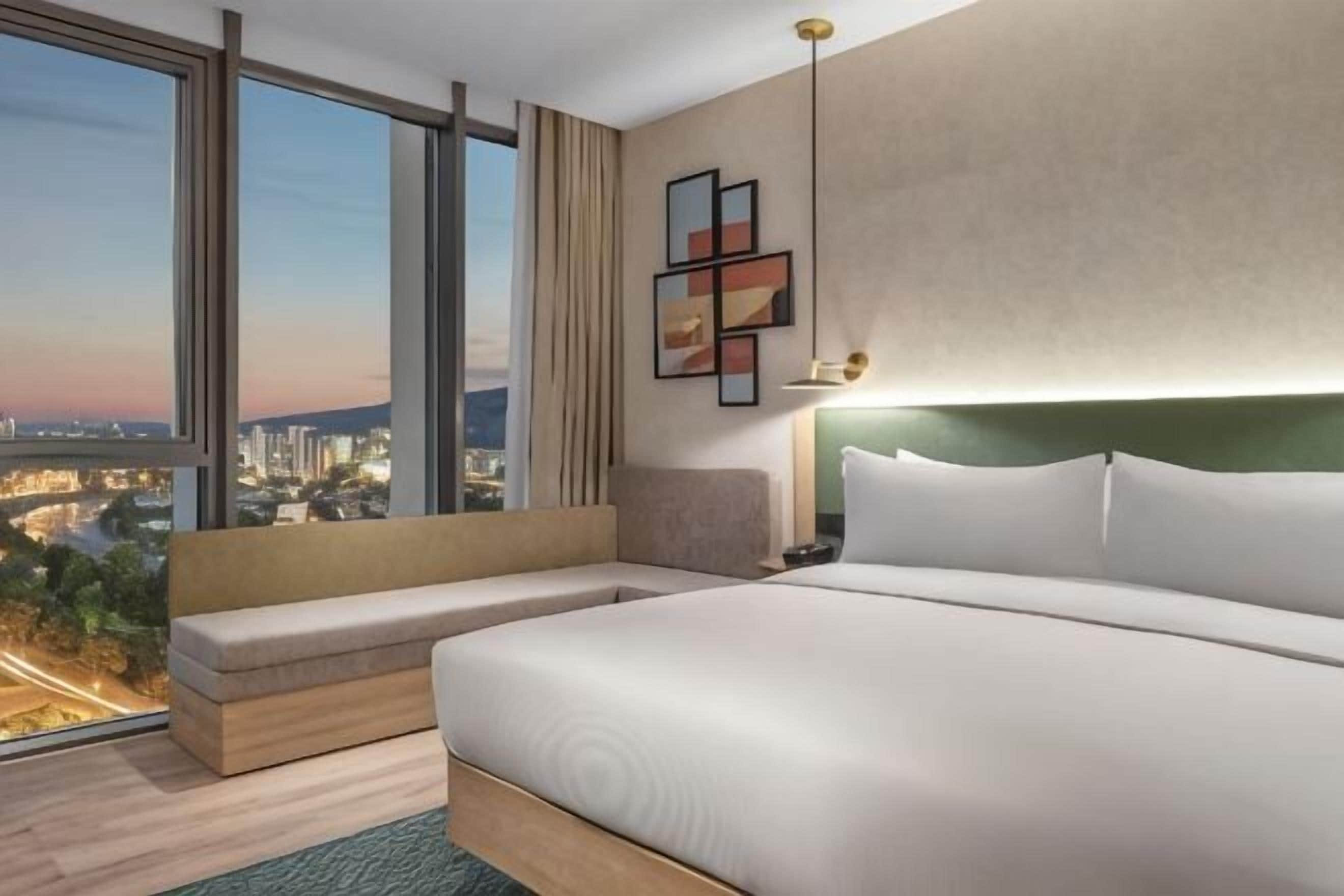 Hypo-allergenic bedding, in-room safe, desk, laptop workspace