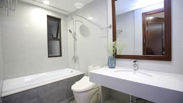Hydromassage showerhead, designer toiletries, hair dryer, bathrobes