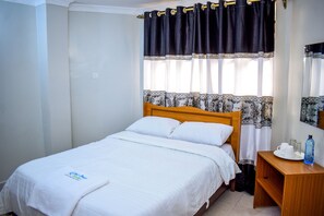 Egyptian cotton sheets, premium bedding, minibar, individually decorated