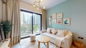 Comfort Apartment | Living area | 58-inch flat-screen TV with cable channels, TV, Netflix - Euro Residences 206 (Dubai)