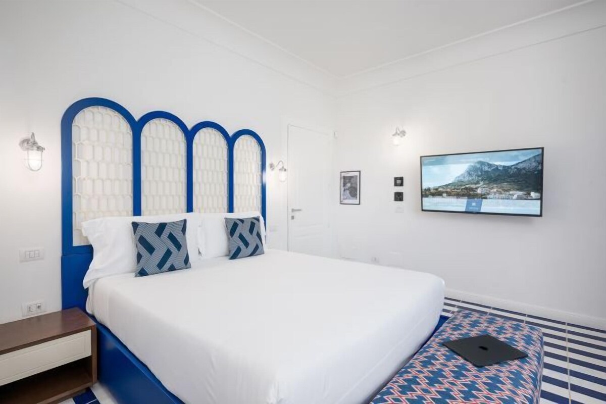 Ropa de cama de alta calidad, minibar, caja fuerte y escritorio