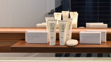 Shower, rainfall showerhead, designer toiletries, hair dryer