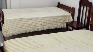 Roupas de cama premium, Wi-Fi de cortesia, roupa de cama