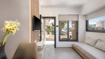 Apartamento luxo | Área de estar | TV de tela plana