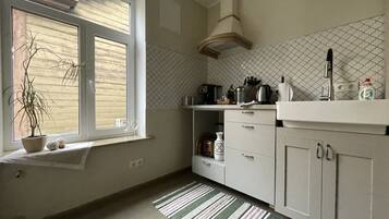 Departamento | Cocina privada | Refrigerador, microondas, cafetera de espresso y cafetera y tetera