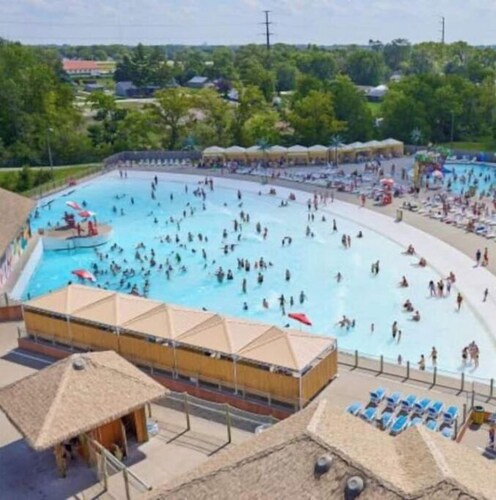 Enjoy golf course views with hot tub and fire pit. Three bedrooms, sleeps seven.