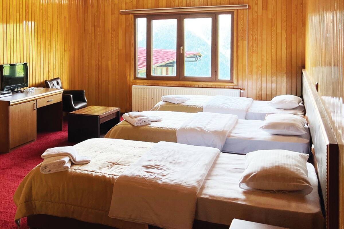 Premium bedding, desk, laptop workspace, iron/ironing board (on request)