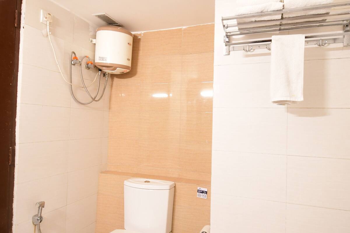 premium suite with balcony | bathroom | shower, hair dryer, towels, soap