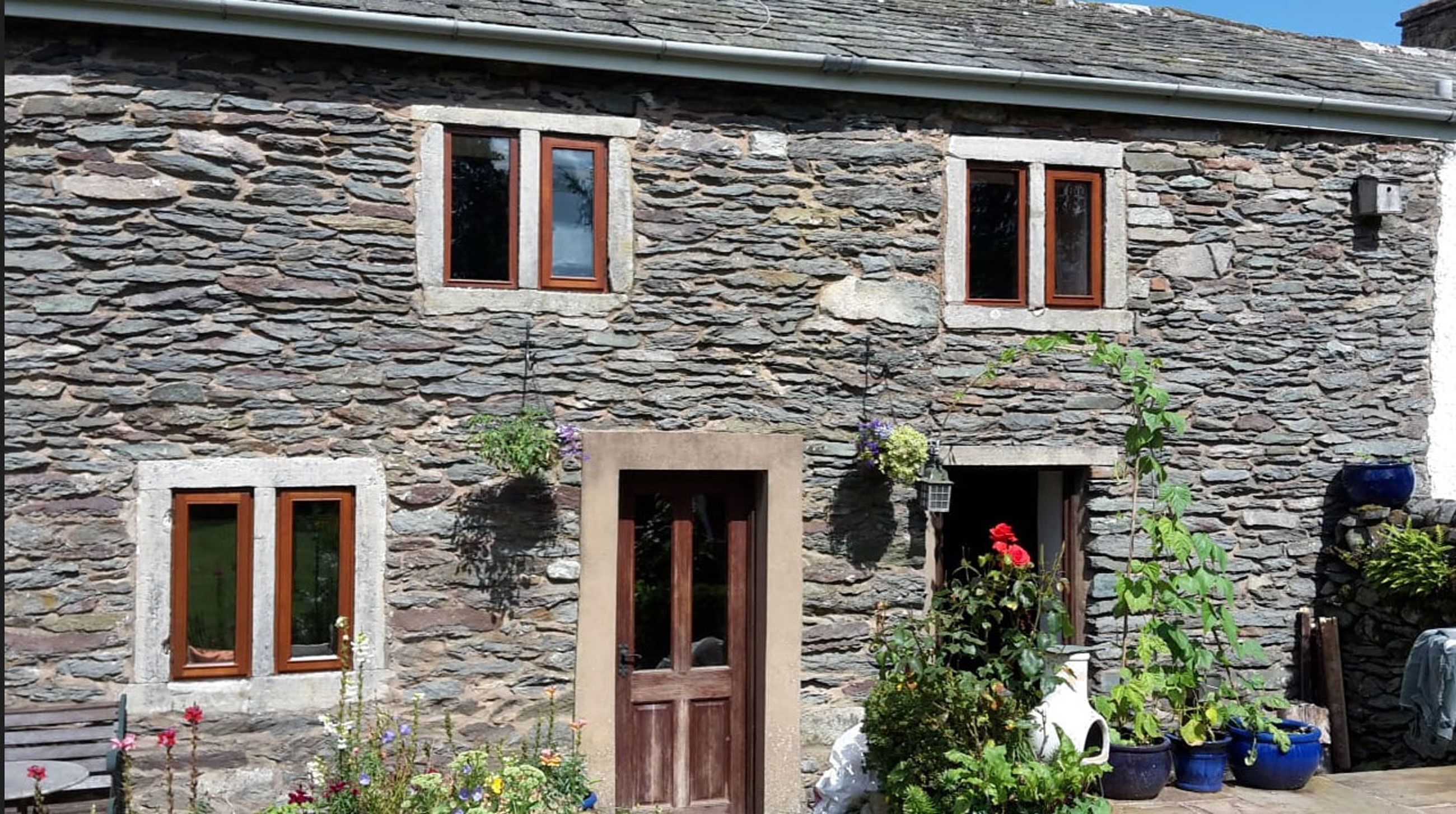 17th century Westmorland stone cottage retaining many original features. Haweswater and Ullswater La