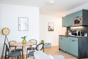 One - Bedroom Suite | Private kitchen | Fridge, coffee/tea maker, electric kettle