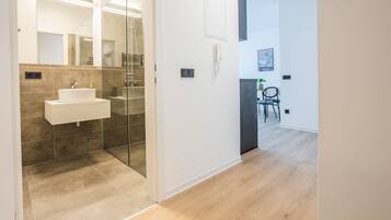 One - Bedroom Suite | Bathroom | Eco-friendly toiletries, hair dryer, towels, soap