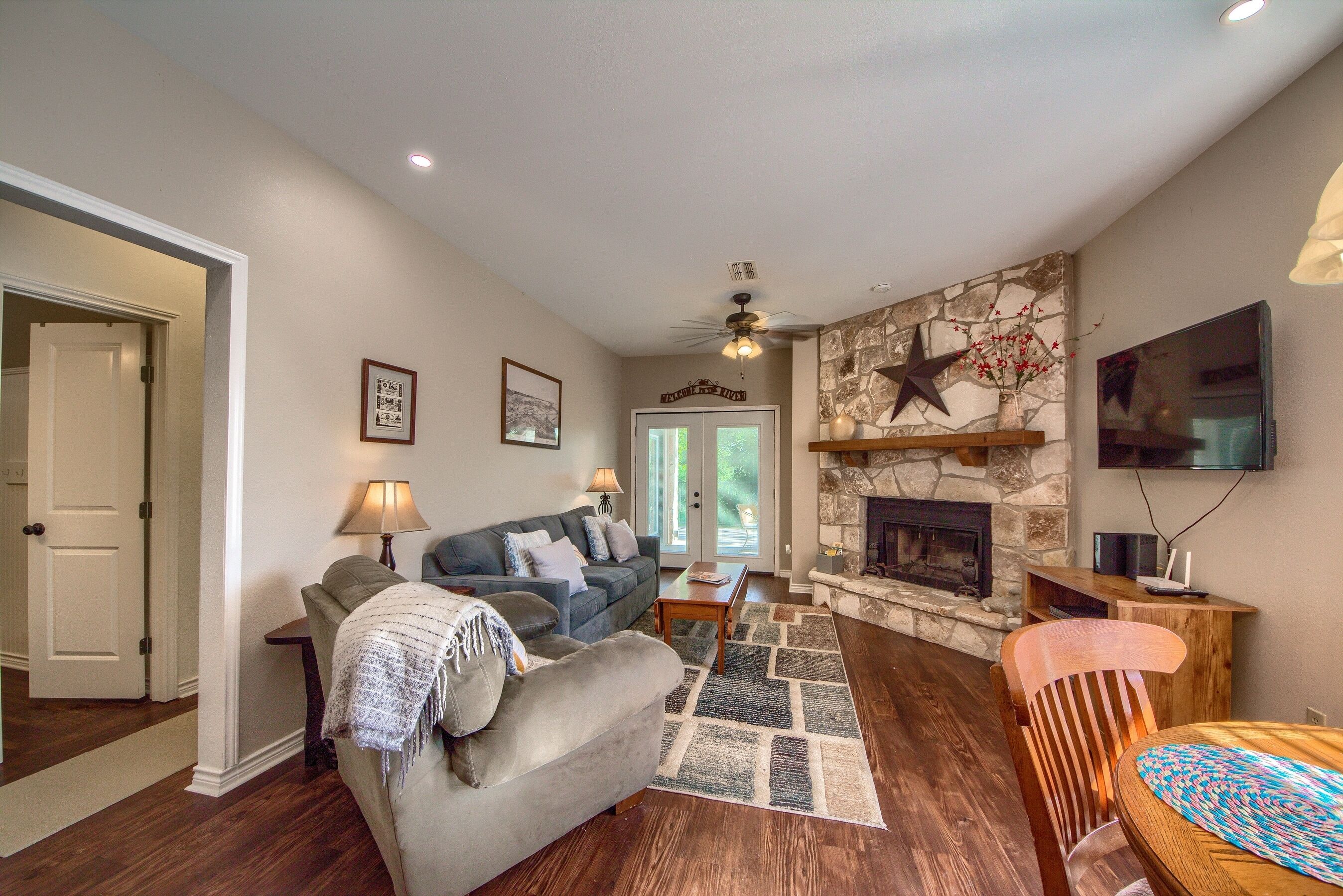 Beautiful condo on the Guadalupe River in downtown New Braunfels with a pool.