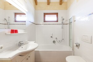 Junior Suite | Bathroom | Hair dryer, towels