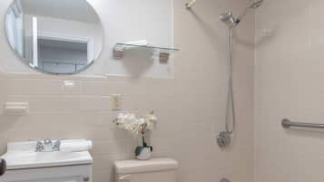 Bathtub, hair dryer, towels