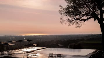 Outdoor pool, pool umbrellas, sun loungers