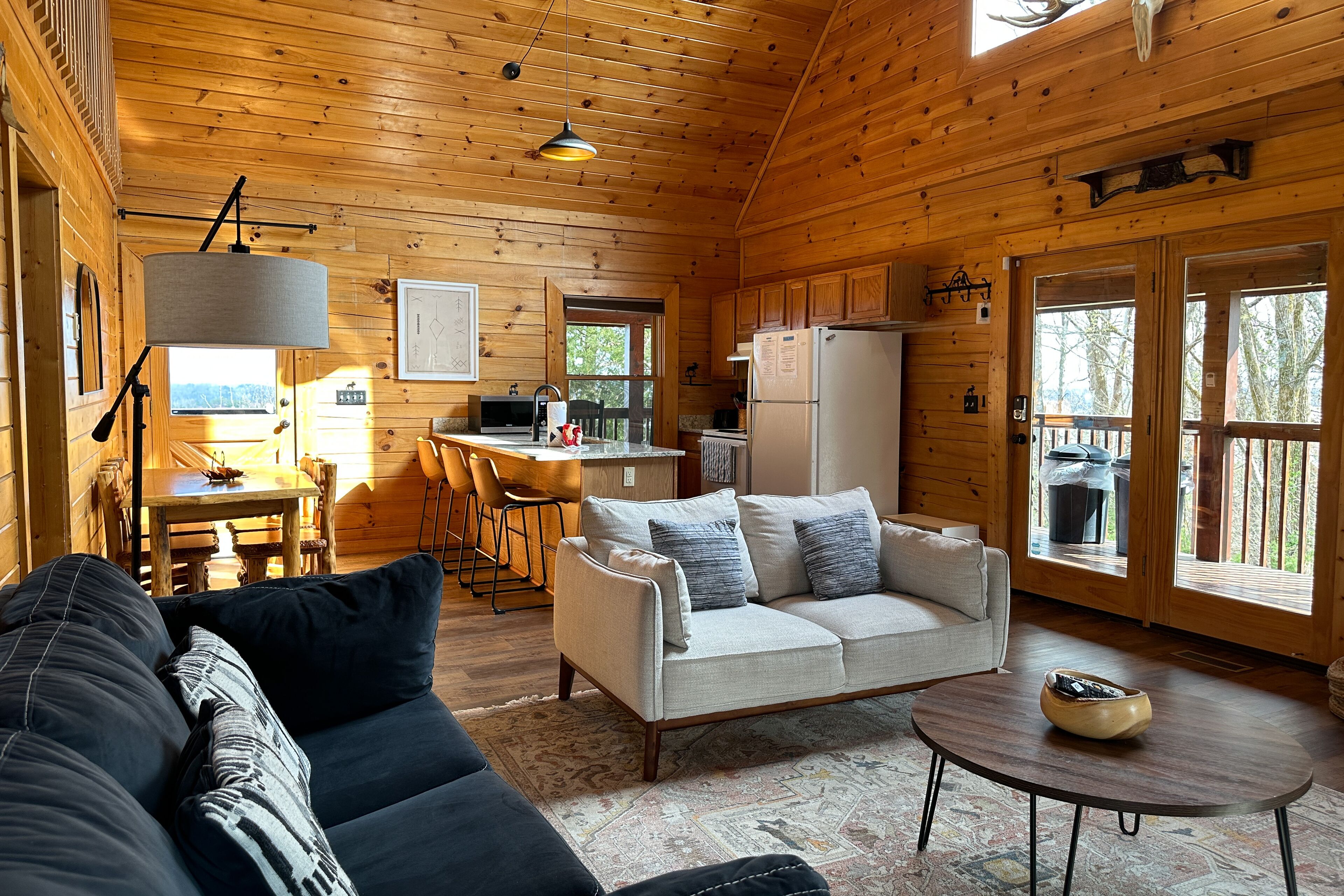 Lake & mountain view cabin with balcony, hot tub, pool table, & pool access