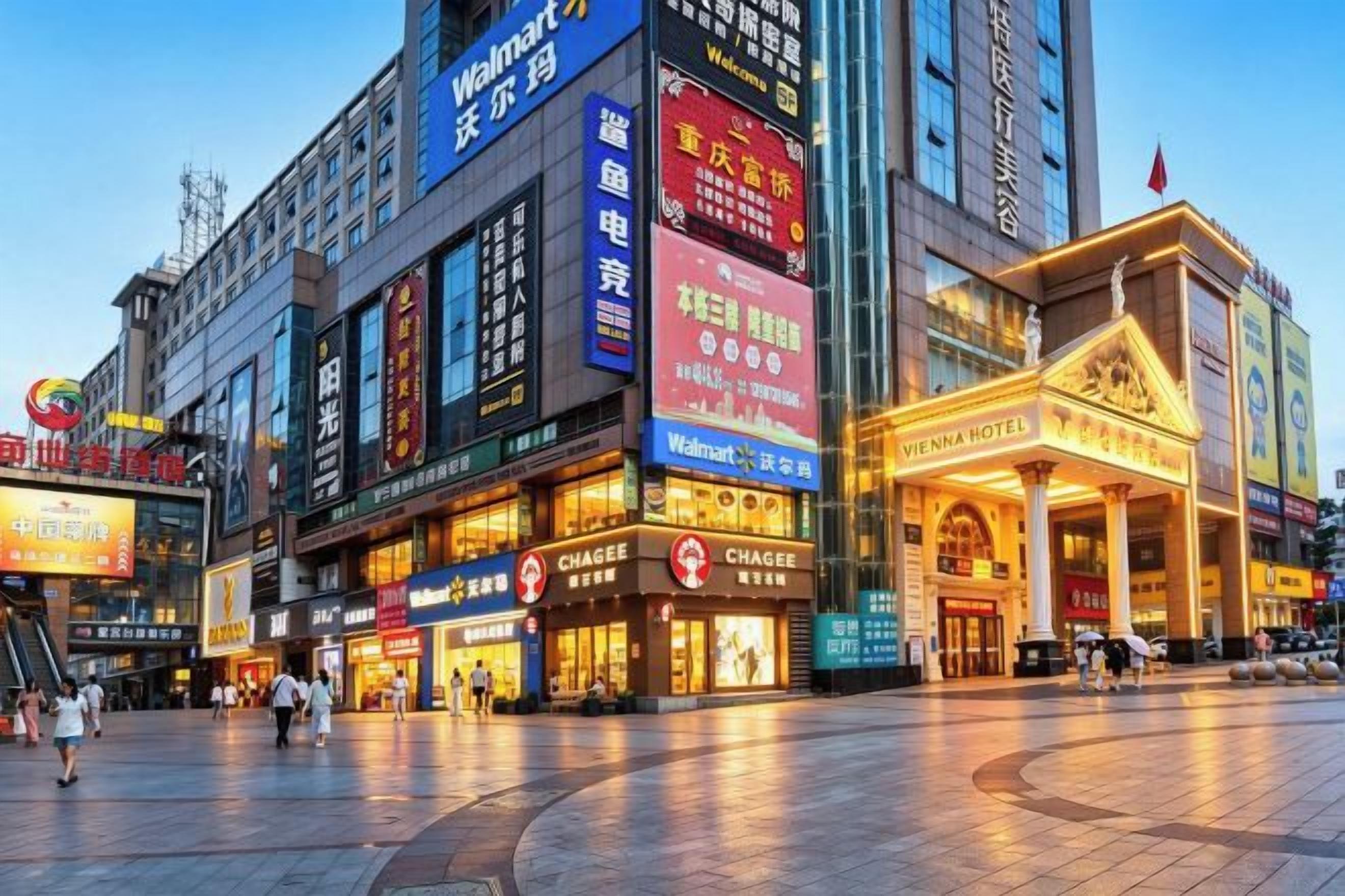 A hotel with a classical facade, large signage, and a prominent entrance.