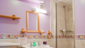 A bathroom with a sink, mirror, and shower. - 3 bedroom accommodation in Onecote (Onecote)