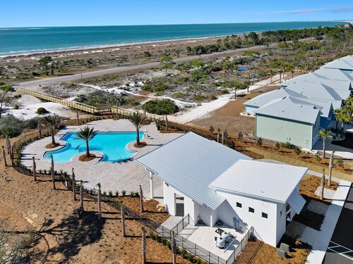 Cypress Sunshine is a 4BD/2BA home steps from north pool & beach boardwalk! Rent onsite golf cart!