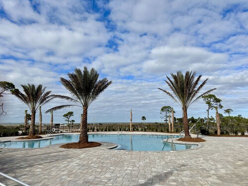 CYPRESS SUNSHINE IS A 4BD/2BA HOME  ACROSS THE STREET FROM COMMUNITY POOL!