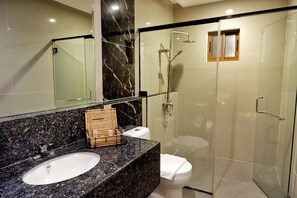 Suite, 2 Queen Beds, Pool View | Bathroom | Hydromassage showerhead, hair dryer, bidet, towels