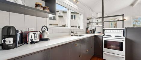 Fridge, microwave, toaster, cookware/dishes/utensils