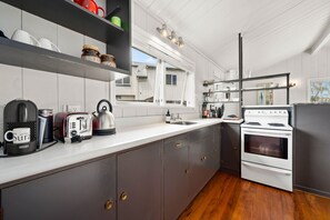 Fridge, microwave, toaster, cookware/dishes/utensils - Mid-Century Charm - Taupo Holiday Home (Rainbow Point)