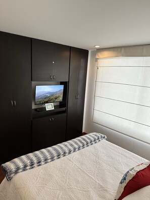 1 habitación, tabla de planchar con plancha, wifi gratis y ropa de cama 