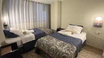 Kamar Twin Comfort | 6 kamar tidur, seprai premium, selimut bulu angsa, dan Wi-Fi gratis