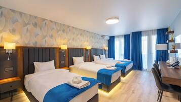 Family Quadruple Room, Non Smoking | Hypo-allergenic bedding, laptop workspace, soundproofing